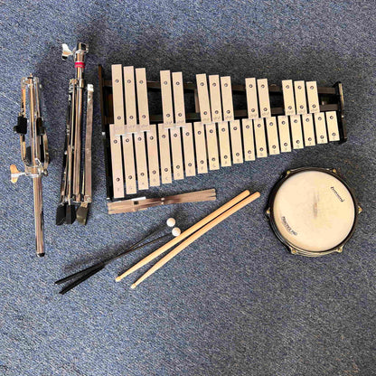Ludwig Bell kit with drum pad sticks mallets and rolling bag.  (used)