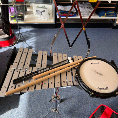 Ludwig Bell kit with drum pad sticks mallets and rolling bag.  (used)